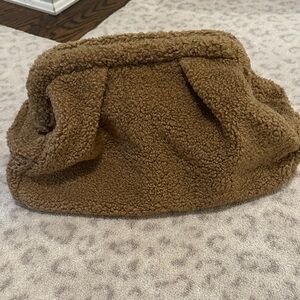 Mango shearling dumpling clutch